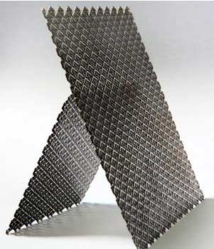 Material de titanio para implantes quirúrgicos.