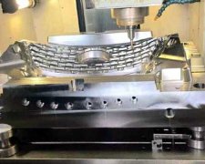 Application of five-axis high-speed machining center in automobile cover mould