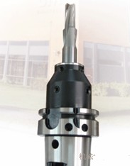 Spiral groove PCD reamer